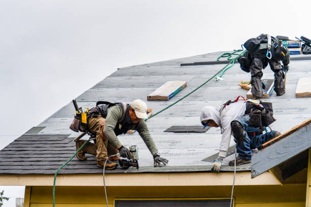 Professional Gutter Installation technician working in Fulton, MS